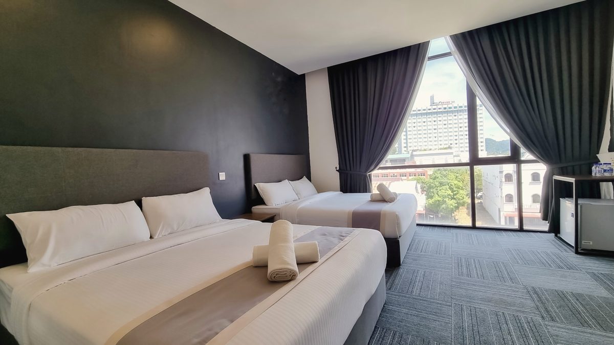 Quad Family Room with two queen beds and a large window